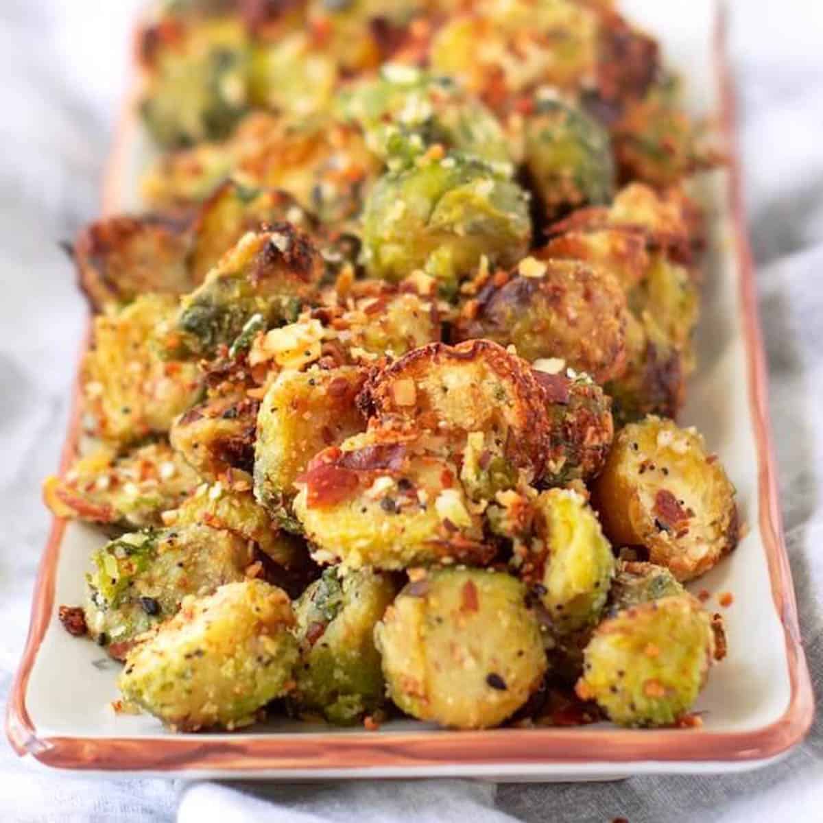 air fried brussels on rectangular tray.