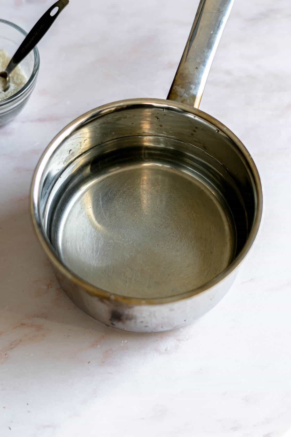 boiling water in pot with sea salt in it.